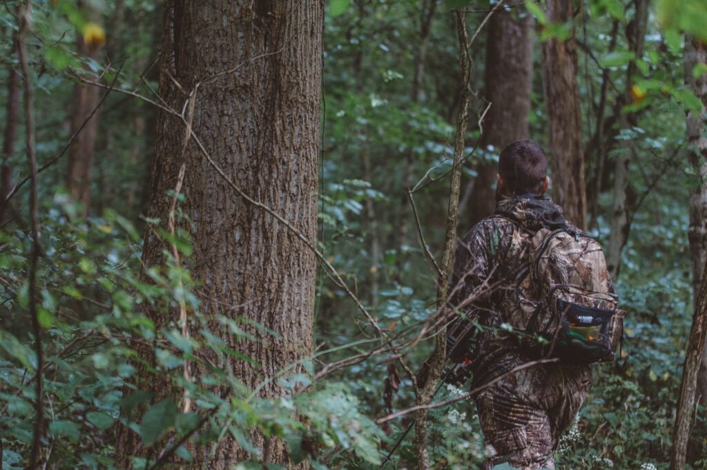 A man hunting in the woods
