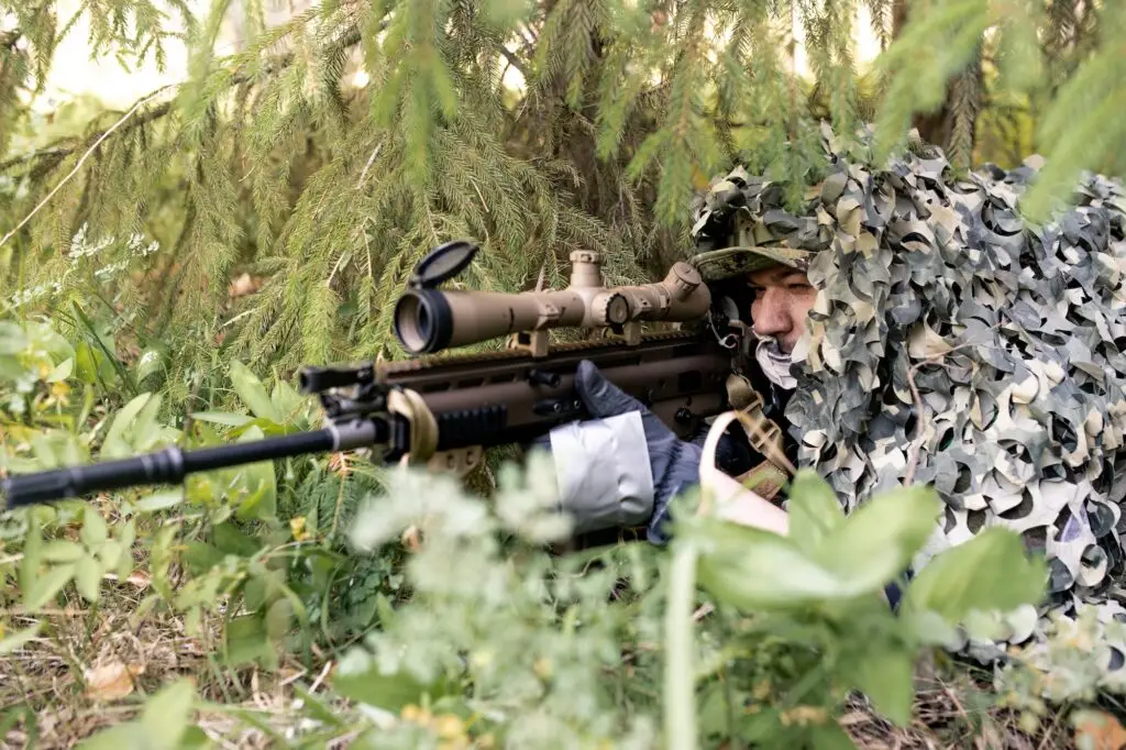 longrange hunting - hunter with camouflage 